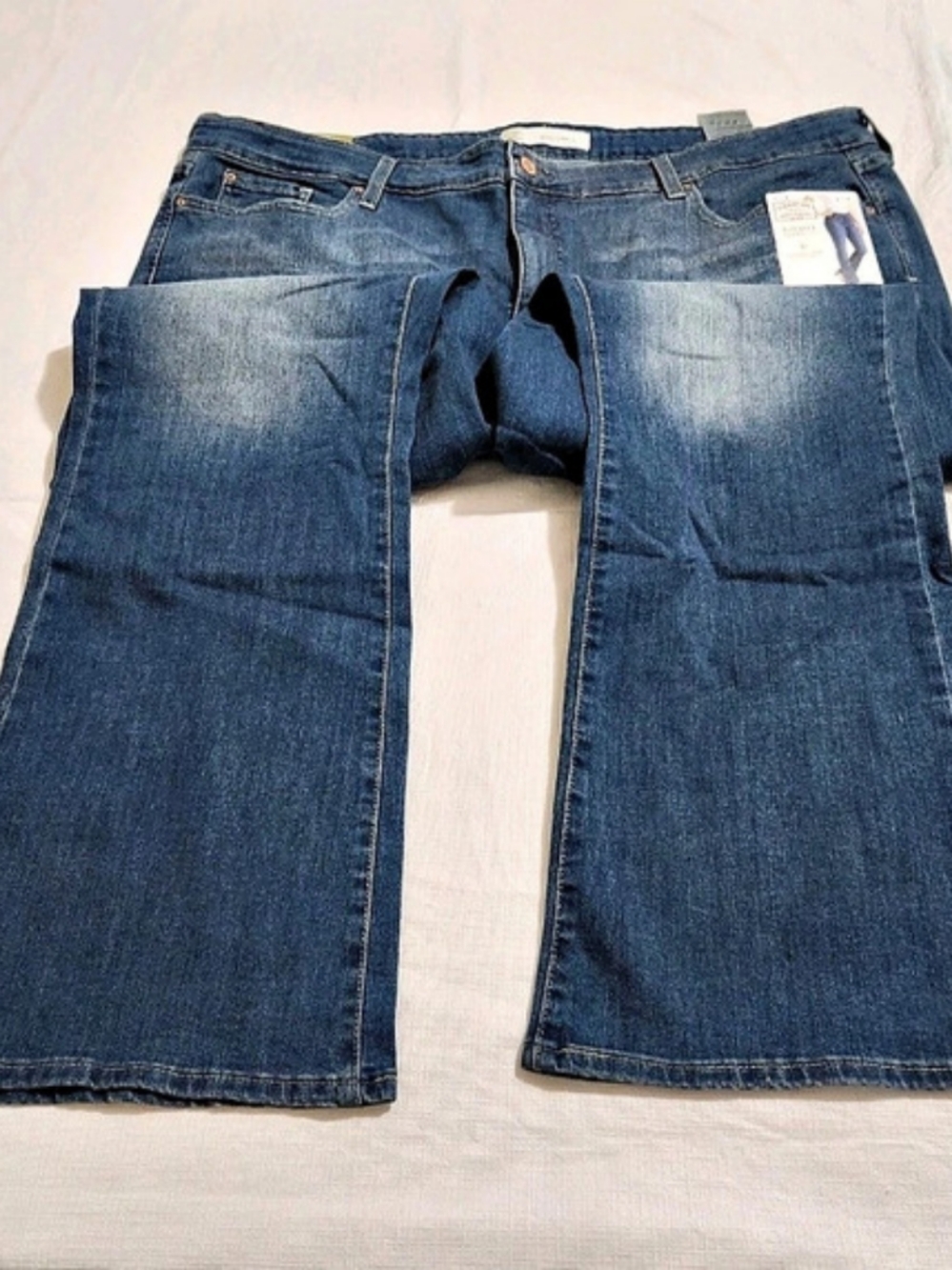 Signature by Levi Strauss & Co. Totally Shaping Mid Rise Bootcut. Bootcut Jeans